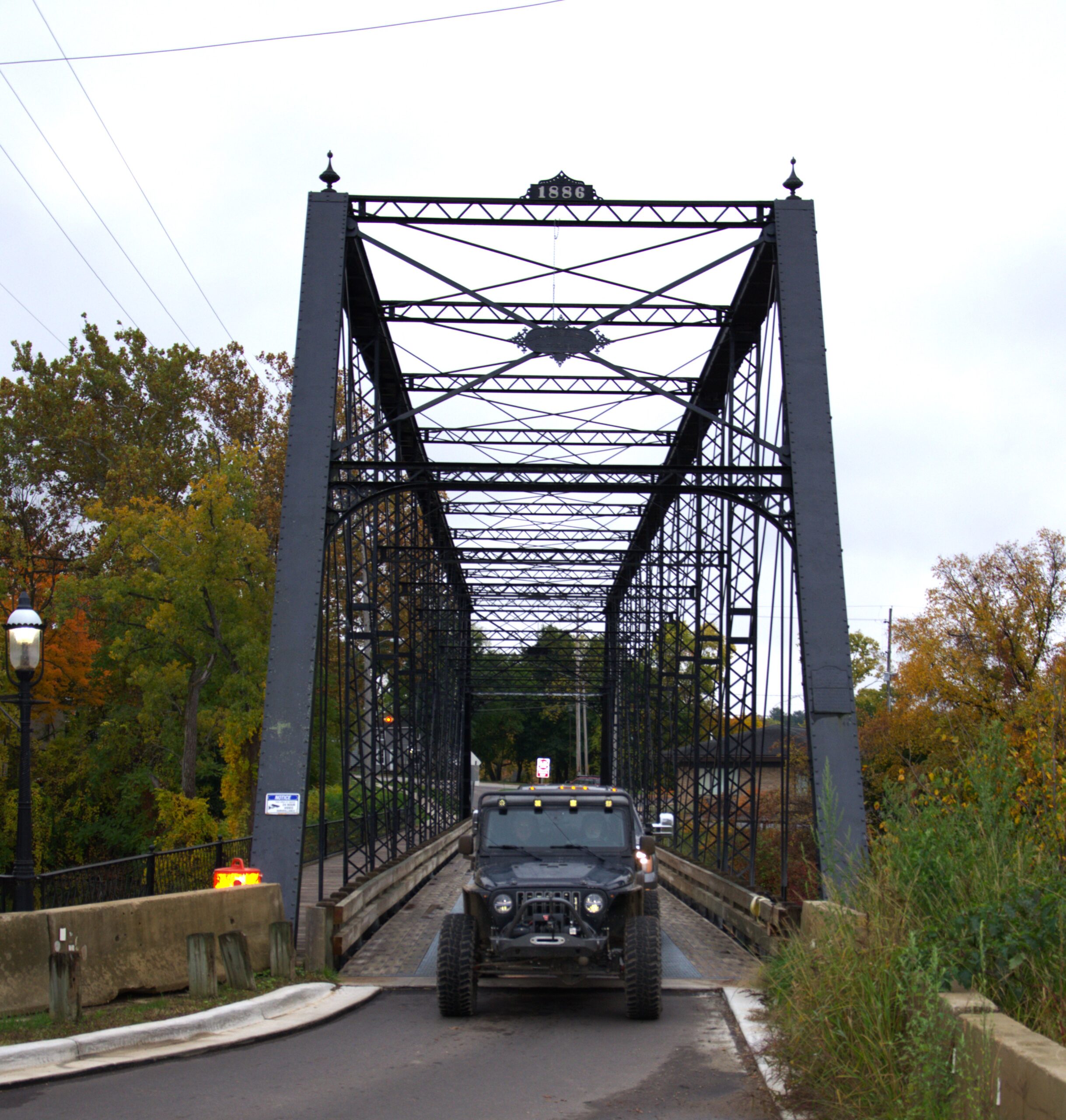 Allegan bridge black jeep