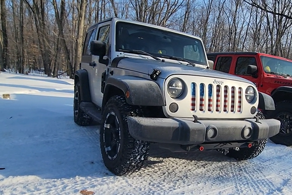 Greg Z silver JK snowy evart