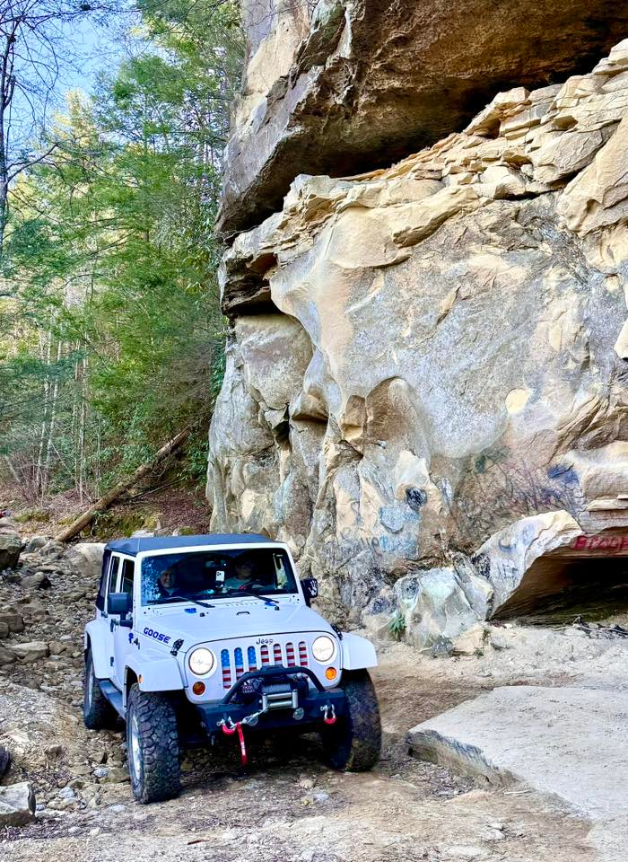 Kelley's JKU with a giant rock face